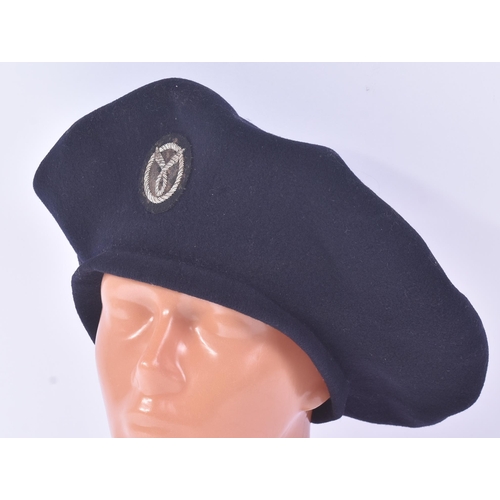 21 - A WWII Second World War related French Milice ( Milita ) Officers beret. Blue wool construction with... 