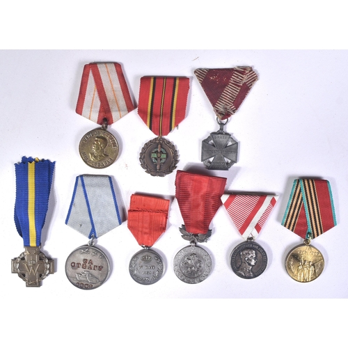 214 - A collection of assorted European First and Second World War (and other) military campaign medals co... 