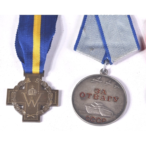 214 - A collection of assorted European First and Second World War (and other) military campaign medals co... 