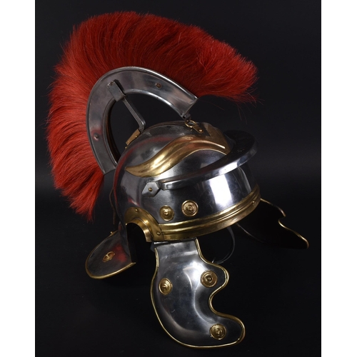 216 - A 20th Century Roman Centurion / Gladiator reenactment Galea helmet. The helmet of steel and brass c... 