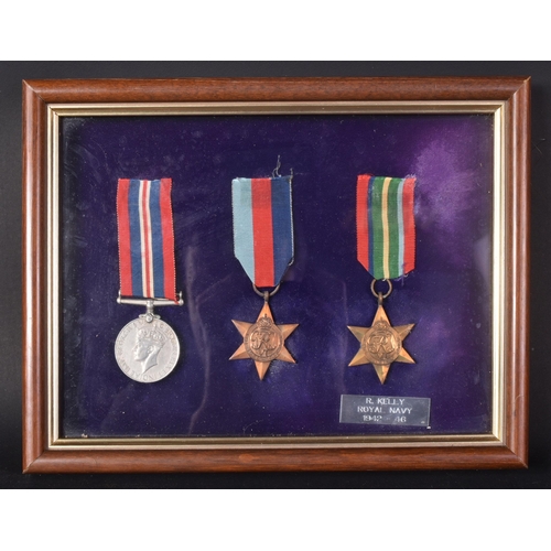 339 - A WWII Second World War British medal trio awarded to one R. Kelly the Royal Navy comprising; The Wa... 