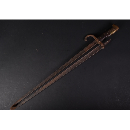 351 - A 19th Century 1874 pattern Gras rifle bayonet trench art in the form of fireplace tongs. The second... 