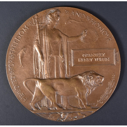 38 - A WWI First World War commemorative death plaque / death penny medal, for one Grantley Henry Tuffin.... 