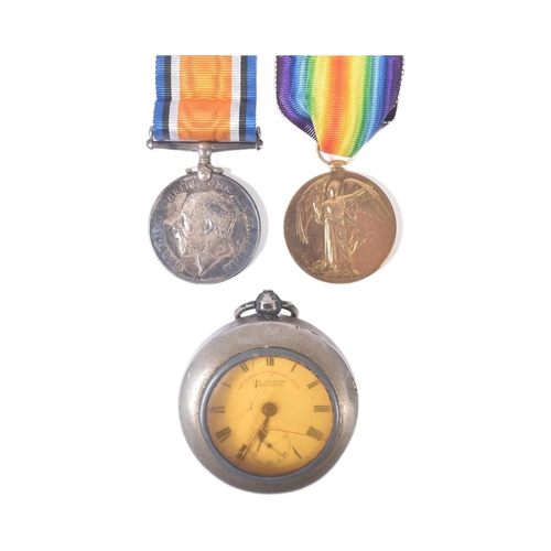 39 - A WWI First World War medal pair and silver pocket watch. The medals awarded to one 26379 Pte W. A L... 