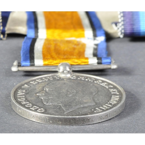 4 - A WWI First World War medal group awarded to one Pte. J. Lindsay of The Royal Highlanders ( Black Wa... 