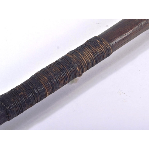 431 - A 19th Century African tribal knobkerrie club with a carved weighted head and slender shaft bound wi... 