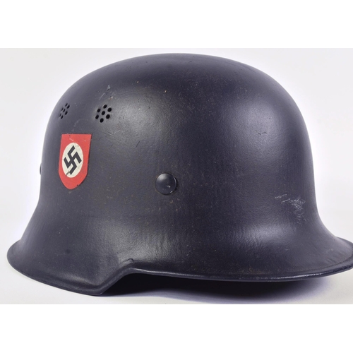 462 - A WWII Second World War interest Third Reich Nazi German style Railway Police Helmet. A black double... 