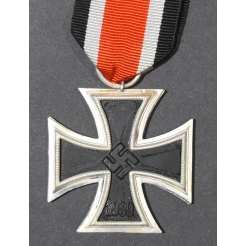 65 - An original WWII Second World War Third Reich Nazi German Iron Cross medal. A Second Class example w... 