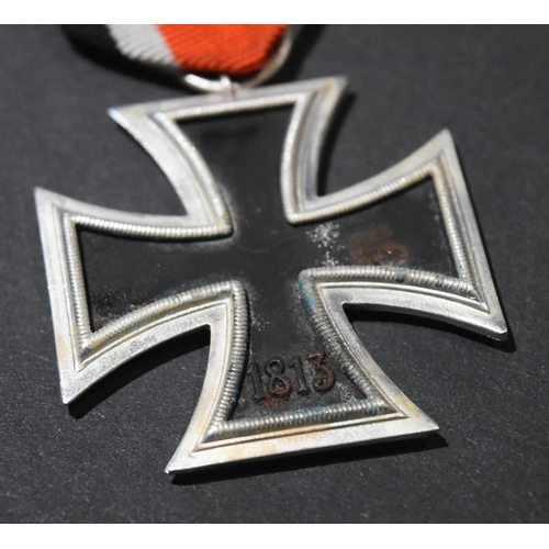 65 - An original WWII Second World War Third Reich Nazi German Iron Cross medal. A Second Class example w... 