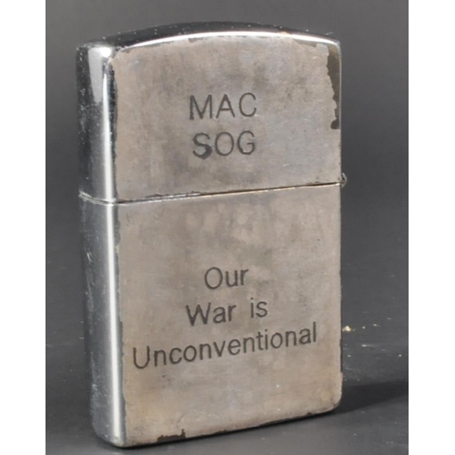 68 - A Vietnam War period US United States Special Forces cigarette lighter. The Zippo made windproof lig... 