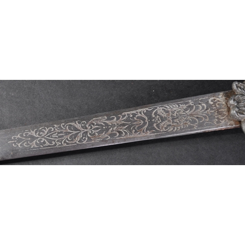 72 - A 19th Century Spanish dagger with a Toledo blade. The dagger having a dome shaped pommel with flora... 