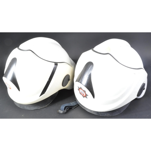 78 - Two vintage 1995 Cromwell made Fire Brigade / Firefighter F600 helmets. The white helmets with flip ... 