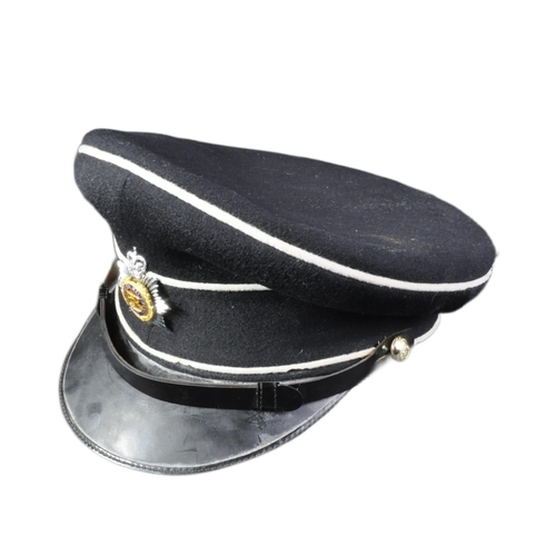 84 - A post war vintage Royal Army Service Corps officers dress uniform peaked cap. Dark blue twilled woo... 