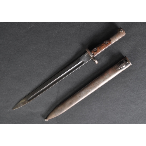 86 - A WWII Second World War period Belgian FN Herstal made M24 export bayonet. Hooked steel pommel with ... 