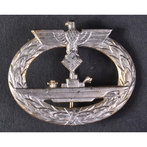 93 - An original WWII Second World War Third Reich Nazi German Kriegsmarine U-Boat war medal / badge. The... 