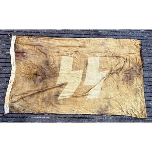 424 - WWII Second World War - a Third Reich Nazi German flag ' SS ' to centre. Faded, various erroneous ma... 