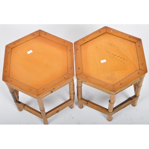 105 - A matching pair of vintage 20th Century bamboo stands. Each of hexagonal form with bamboo legs unite... 