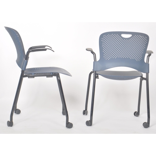 108 - Herman Miller - Caper - A set of four contemporary stacking office desk chairs with each bearing arm... 