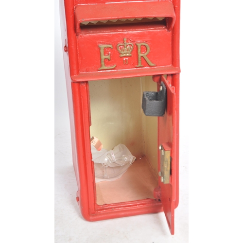 128 - A contemporary replica Royal Mail post office / wall post box having a hooded flap set above a hinge... 