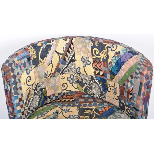 129 - A 19th Century Victorian corner armchair / chair having patterned patchwork upholstery to the curved... 