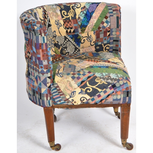 129 - A 19th Century Victorian corner armchair / chair having patterned patchwork upholstery to the curved... 