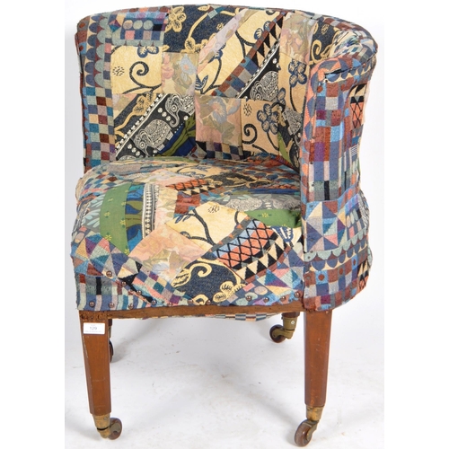 129 - A 19th Century Victorian corner armchair / chair having patterned patchwork upholstery to the curved... 