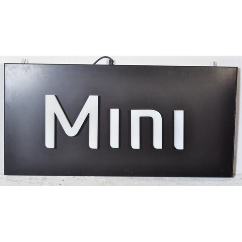 137 - Mini - A contemporary motoring point of sale showroom advertising light sign having a black finished... 