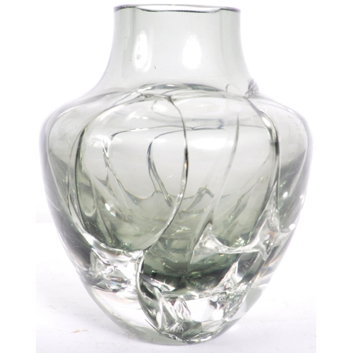 141 - A retro mid 20th Century crackle glass vase in platinum. The vase of ovid tapering form with cracked... 