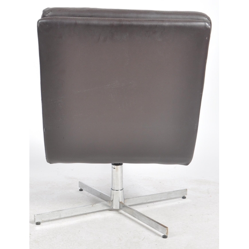 142 - A contemporary dark brown leather swivel lounge chair / lobby chair having removable button backed s... 