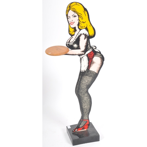 152 - A retro vintage mid 20th Century novelty dumb waiter butlers stand in the form of a scantily clad wa... 