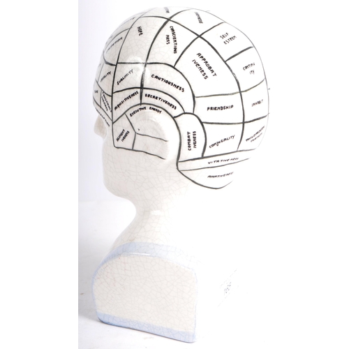 165 - A Victorian manner painted phrenology head in the manner of Fowler. Typical form with painted detail... 