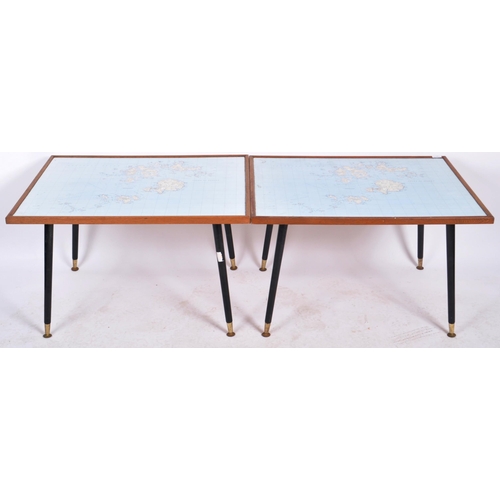 176 - A matching pair of mid 20th Century map coffee tables / low tables. Each having oak frames with maps... 