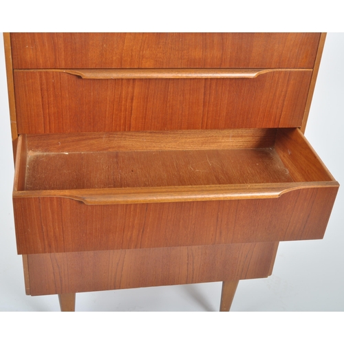 182 - Bceanese - A retro 20th Century teak chest of drawers of upright pedestal form having graduating ban... 