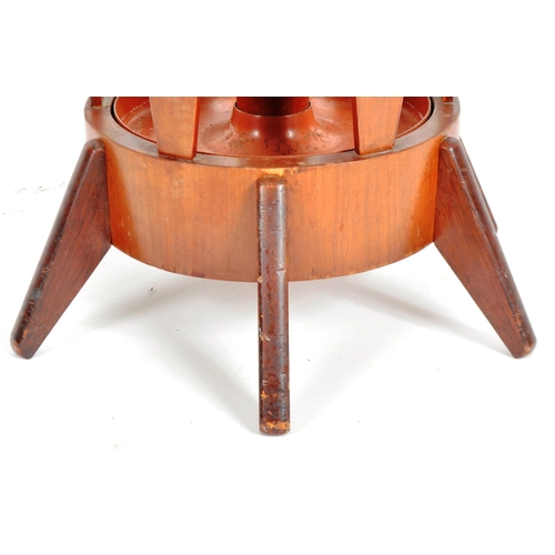 185 - Waring & Gillows - A mid 20th Century teak wood hat and umbrella stand. The lower section of barrel ... 