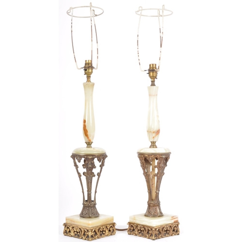 202 - A matching pair of 20th Century Italian influence Hollywood Regency brass and alabaster table lamp l... 