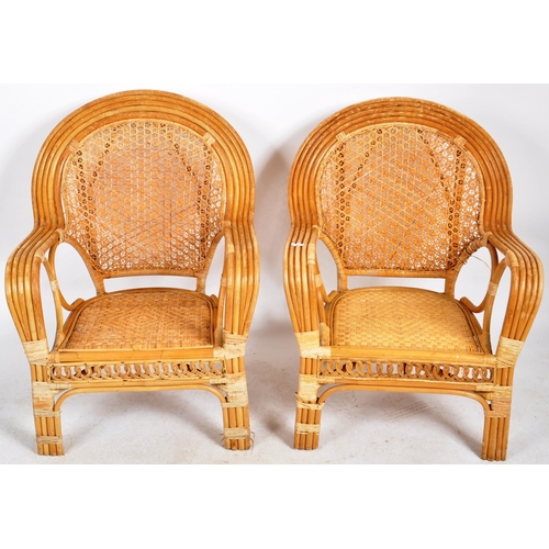 234 - A matching pair of retro 20th Century bamboo armchairs and matching side table / coffee table. Each ... 