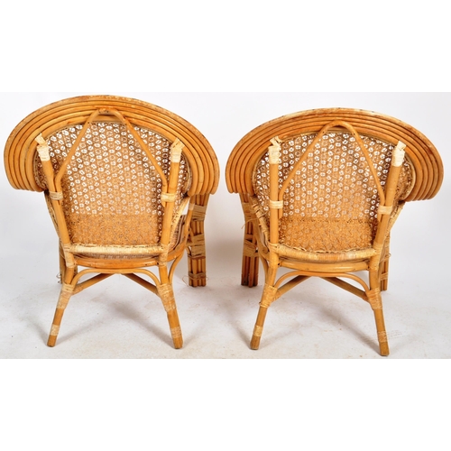 234 - A matching pair of retro 20th Century bamboo armchairs and matching side table / coffee table. Each ... 