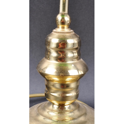 238 - A 20th Century 1980s English bankers desk / table lamp light of brass construction having an adjusta... 