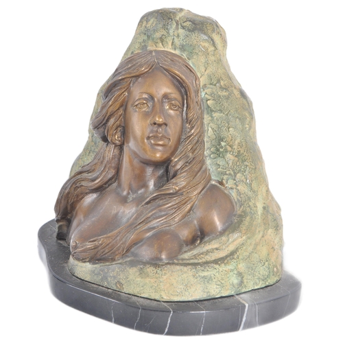 245 - Vittorio Pochini - A 20th Century bronze effect metal bust of a female raised on a black marble base... 