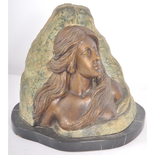 245 - Vittorio Pochini - A 20th Century bronze effect metal bust of a female raised on a black marble base... 