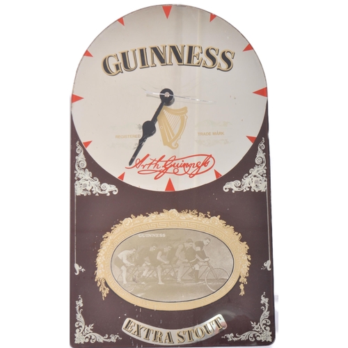 256 - Guinness - A retro 20th Century pub / bar point of sale advertising clock / mirror for Guinness Extr... 