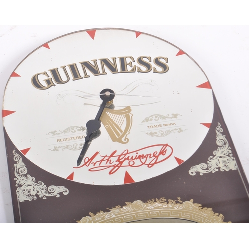 256 - Guinness - A retro 20th Century pub / bar point of sale advertising clock / mirror for Guinness Extr... 