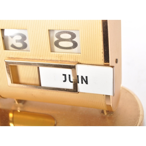 267 - Europa - A retro mid 20th Century desk clock and calendar having two separate section with brass eff... 