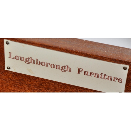 282 - Loughborough Furniture - A retro mid 20th Century 1960s teak chest of drawers having a three drawers... 