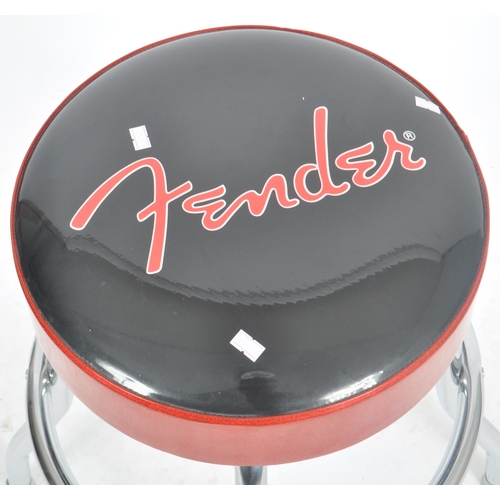 287 - Fender - A Contemporary guitar stool having a polyurethane foam pad top with 'Fender' in red cross t... 