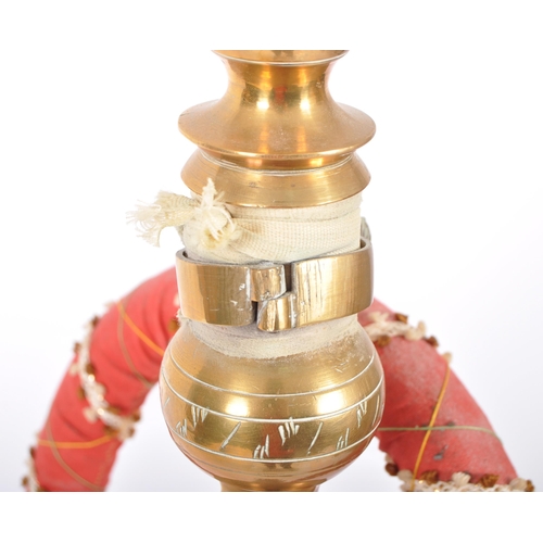 288 - A large retro vintage 20th Century Middle Eastern brass hookah pipe having geometric patterns to the... 