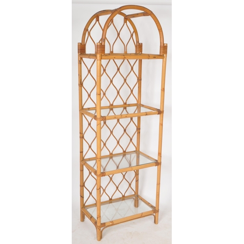 292 - A retro vintage 20th Century bamboo and cane upright bookcase / display shelves having a domed top w... 