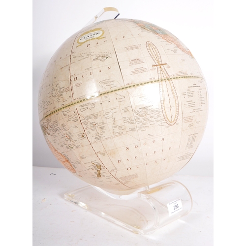 296 - George F Cram Company - A 20th Century American desk top globe raised a one piece moulded Perspex st... 