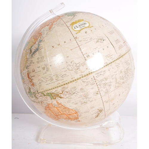 296 - George F Cram Company - A 20th Century American desk top globe raised a one piece moulded Perspex st... 