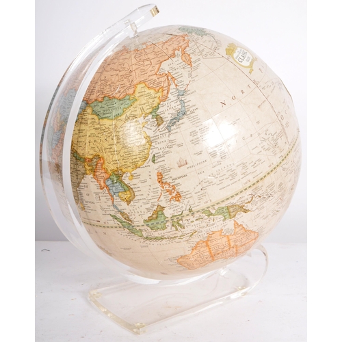 296 - George F Cram Company - A 20th Century American desk top globe raised a one piece moulded Perspex st... 